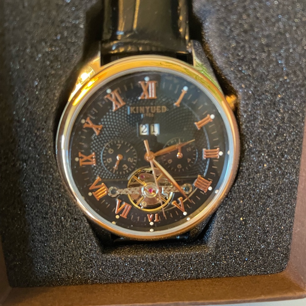 Kinyeud beautiful black watch. Absolutely gorgeous!